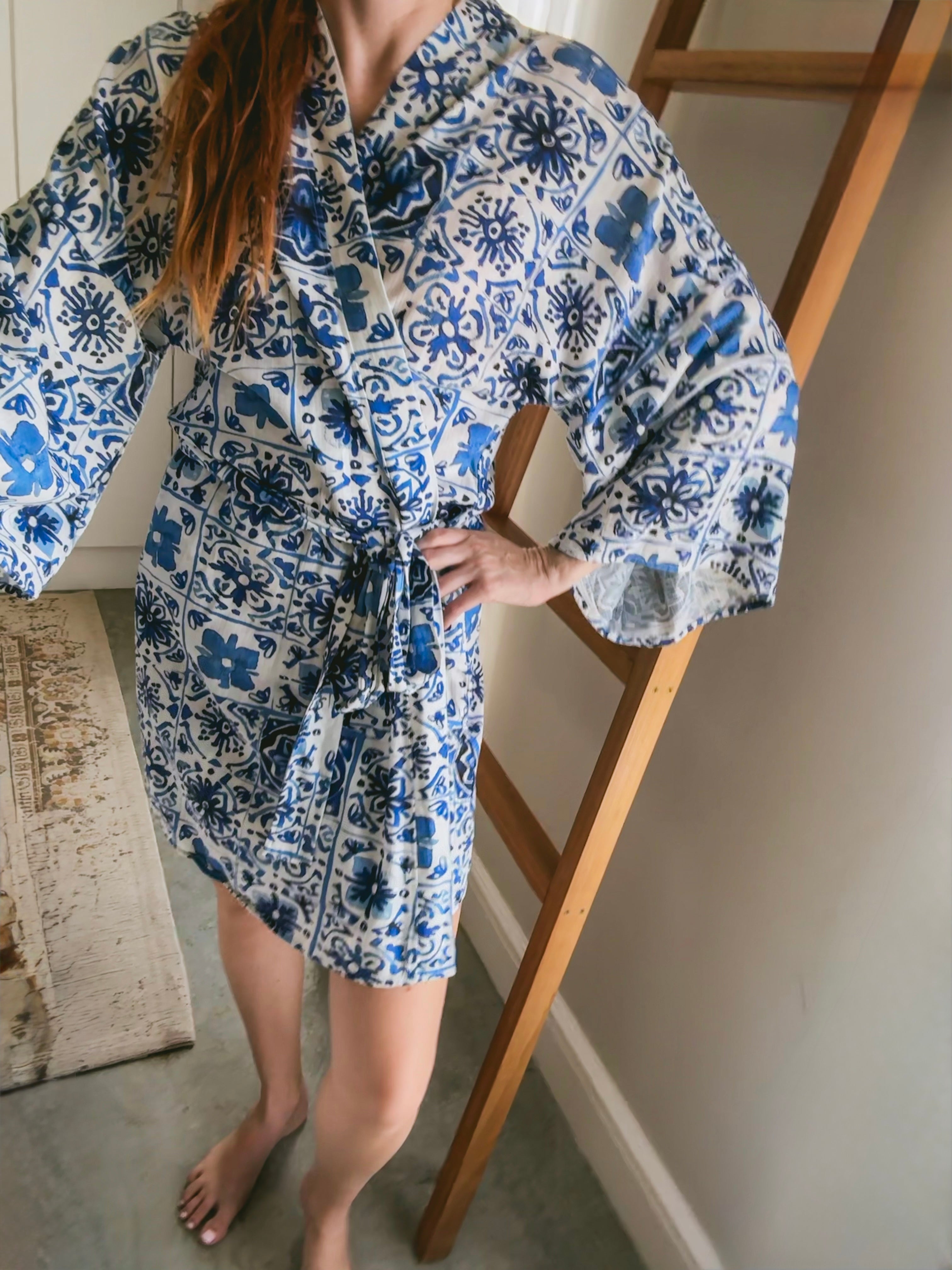Front view of women wearing a blue Moroccan tile print kimono wrap gown made from Ecovero Viscose Linen.