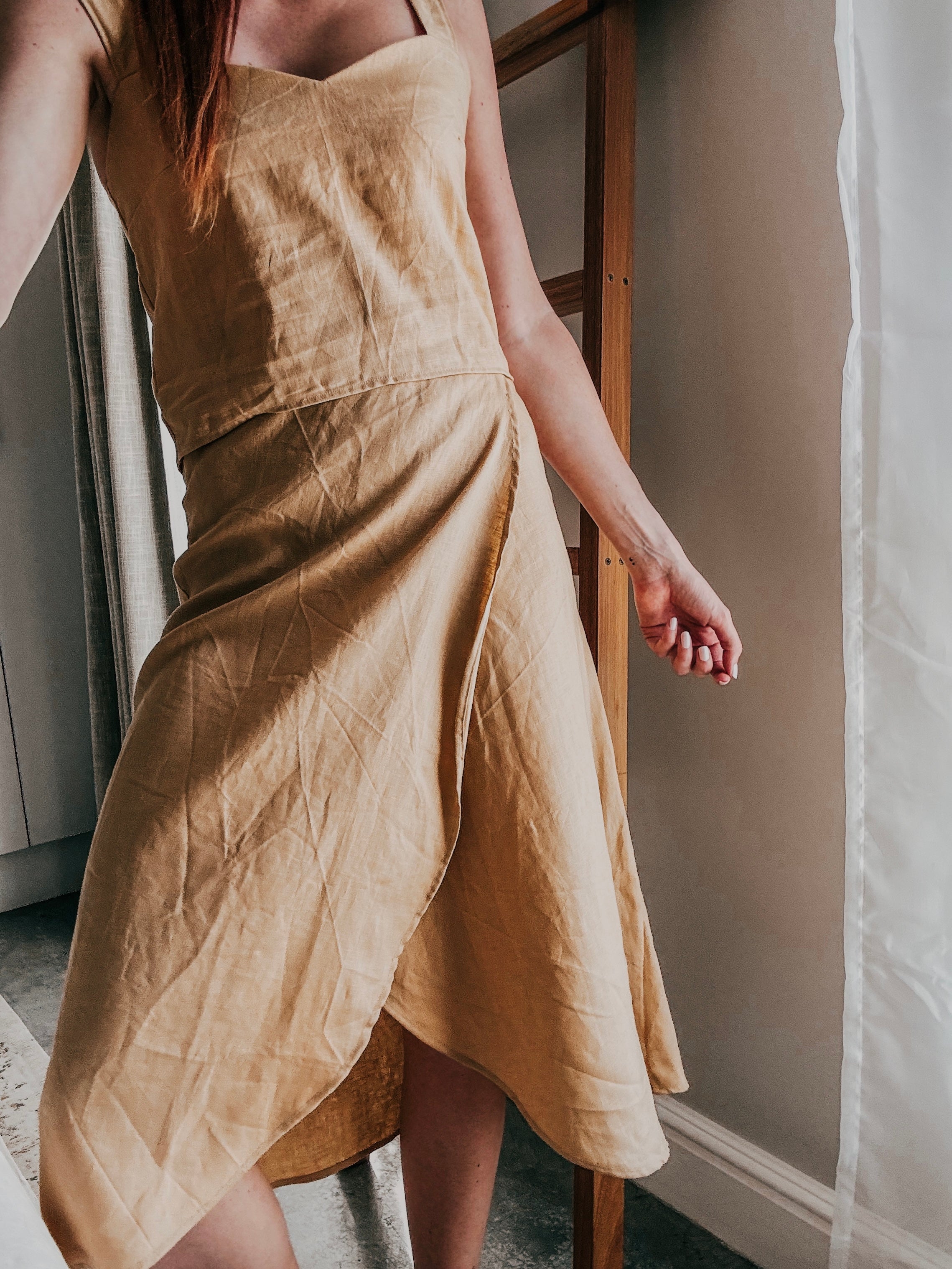 Model wearing a matching pure linen set, showcasing the fabrics lovely natural texture and soft drape.
